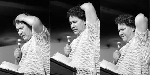 Acosta reading a chapter from "Revolt Of The Cockroach People" at the Festival de Flor y Canto, held in 1973 at the University of Southern California in Los Angeles. These photos capture Zeta as he holds back tears reading his description of the autopsy of Robert Fernandez. The passage describes in grisly detail how the team of coroners peel back the corpse's face and scalp to reveal a sand-filled cranium and a small bag holding Fernandez' brain. Photo Credit: Michael V. Sedano.Copyright 1973, 2008.